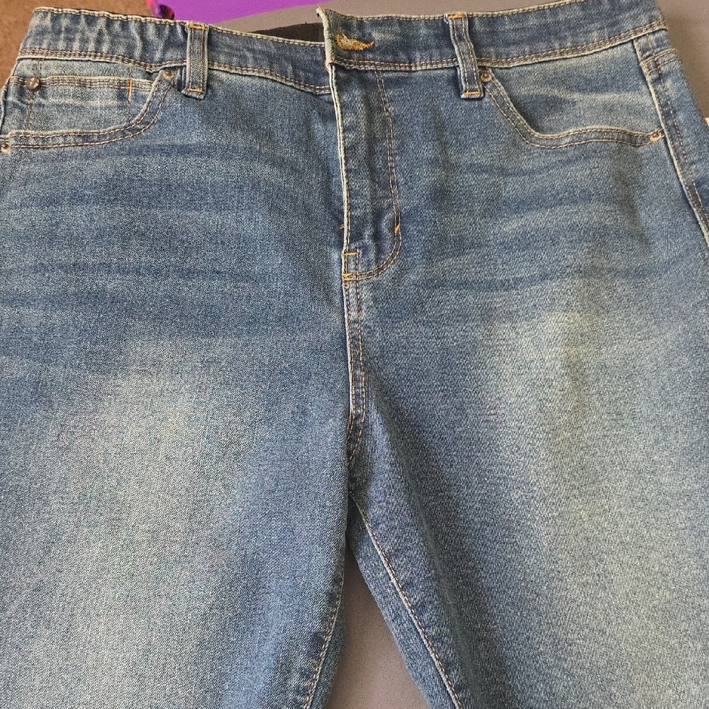 Blue Straight Leg Jeans with Light Wash and Distressed Details